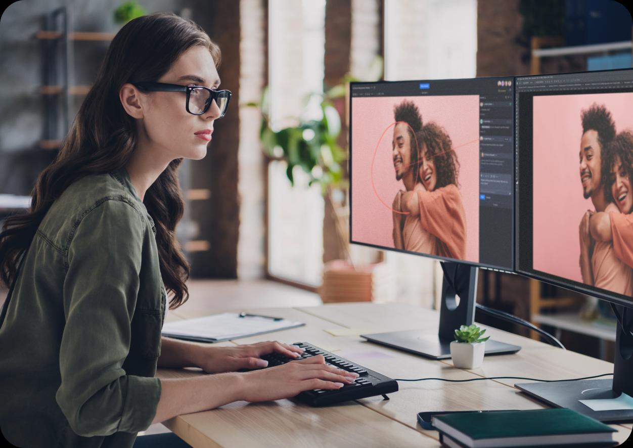 Creative designer sitting in front of the desk leveraging use of top online proofing software - Ziflow-1