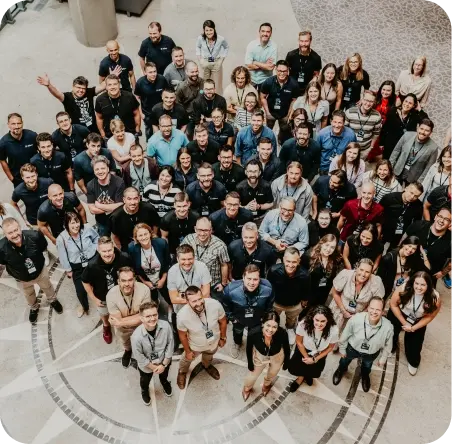 Ziflow team group photo in Warszawianka hotel hall from above shot